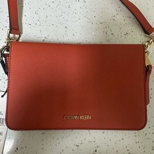 Calvin Klein Hayden Orange Crossbody Bag with Minimalist Design